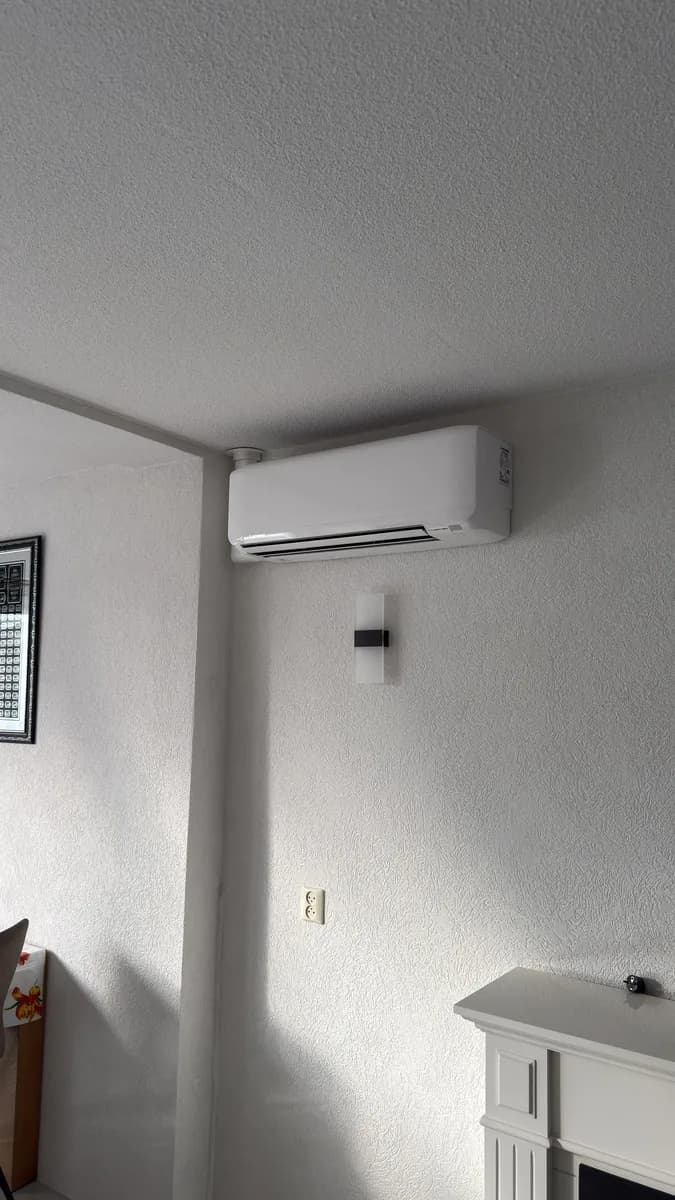Mitsubishi binnenunit in woonkamer Rotterdam